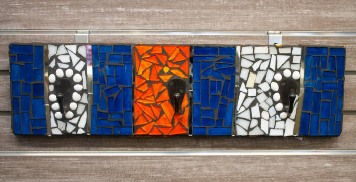 3 hooks with blue, orange, and white glass